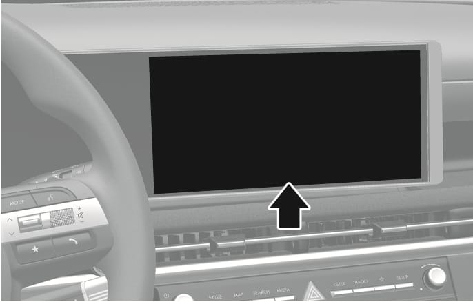 2025 Hyundai Tucson infotainment system image. A black arrow with a white outline points upward to the wide rectangular display screen located on the center dashboard above the air vents. Explains the location of the infotainment system screen.