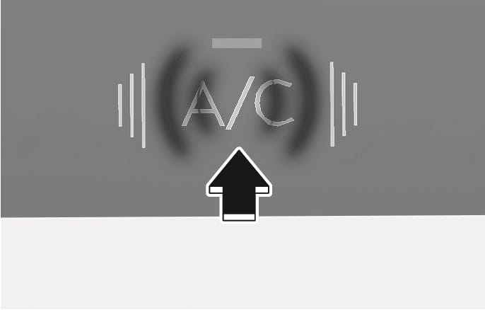 2025 Hyundai Tucson A/C button image. A black arrow points upwards to the button labeled 'A/C' with wavy lines and an indicator light above. Explains the function of pressing the button to manually turn the air conditioning system on and off.