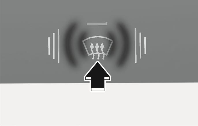 2025 Hyundai Tucson front windshield defroster button image. A symbol depicts a windshield with three wavy arrows pointing up, surrounded by curved lines. A large black arrow points upward at the symbol. This explains the function of pressing the button to activate the front windshield defroster.