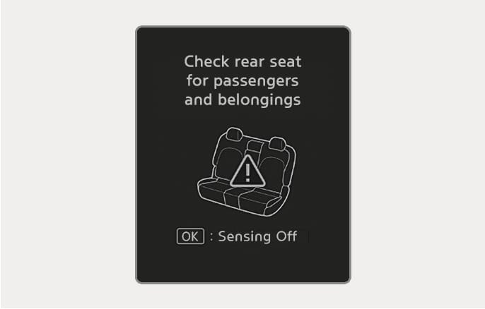 2025 Hyundai Tucson Rear Occupant Alert warning message image. The cluster displays 'Check rear seat for passengers and belongings' text and a rear seat icon with a warning triangle. '[OK] : Sensing Off' is shown at the bottom. This explains the function reminding the driver to check the rear seats.