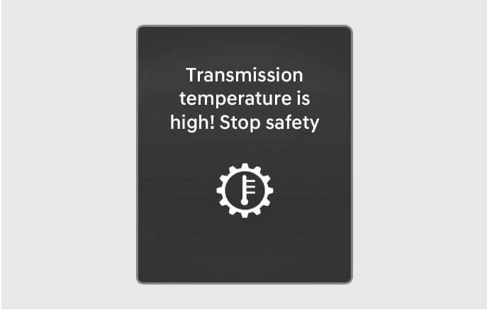 2025 Hyundai Tucson transmission temperature warning message image. The instrument cluster displays the text 'Transmission temperature is high! Stop safely' above a gear icon containing a thermometer symbol. Explains the warning displayed when the transmission overheats and instructs the driver to stop safely.