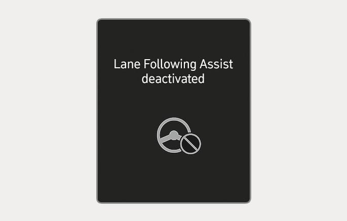 2025 Hyundai Tucson Lane Following Assist deactivated warning message image. The screen displays the text 'Lane Following Assist deactivated' above a steering wheel icon with a prohibition symbol. This explains the function that cancels the system when the driver ignores hands-off warnings.