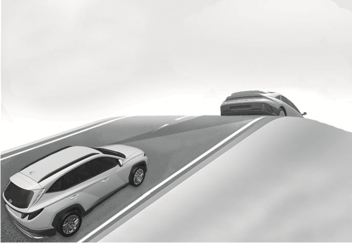 2025 Hyundai Tucson Forward Collision-Avoidance Assist limitation image. A white SUV drives up a steep hill while the vehicle ahead at the crest is partially visible. Explains the limitation where the system may not properly detect a vehicle driving uphill or downhill.