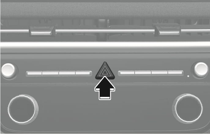 2025 Hyundai Tucson hazard warning flasher button image. A black arrow points upward to the hazard button marked with a triangle symbol on the center fascia. Explains the function of pressing the button to turn the hazard warning flasher on or off.