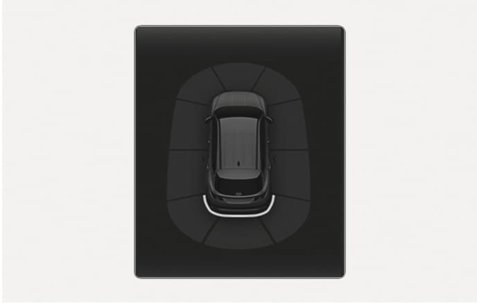 2025 Hyundai Tucson Reverse Parking Collision-Avoidance Assist activation image. A top-down view of the vehicle shows a white curved line appearing behind the rear bumper. This illustrates the visual indicator on the instrument cluster when the system activates while reversing.