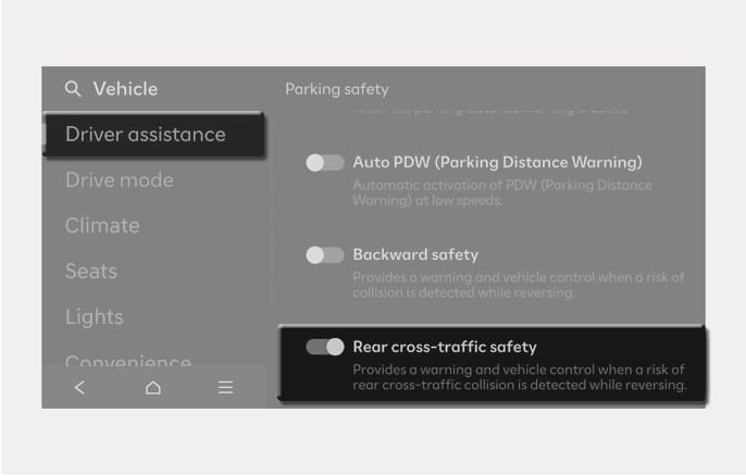 2025 Hyundai Tucson Rear Cross-Traffic Safety settings screen image. The infotainment screen displays the 'Driver assistance' menu with the 'Rear cross-traffic safety' option highlighted under the 'Parking safety' section. The screen text describes providing warnings and vehicle control when a collision risk is detected while reversing. Explains the function to enable or disable the Rear Cross-Traffic Collision-Avoidance Assist.