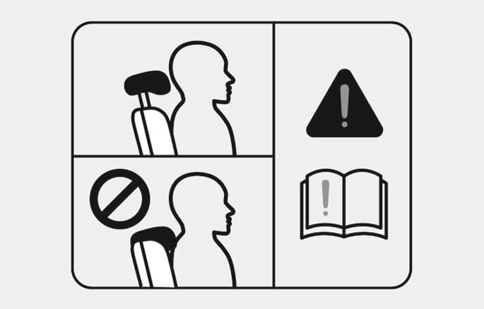2025 Hyundai Tucson rear seat headrest safety warning image. The left side compares a correctly positioned headrest against an incorrect low position marked with a prohibition symbol. The right side shows a warning triangle and manual icon. Illustrates the warning not to adjust the headrest to the lowest position when the rear seat is occupied.