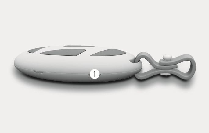 2025 Hyundai Tucson Smart Key image. The side view of the smart key fob indicates the release button (1) located on the side. Describes the mechanism for removing the smart key cover.