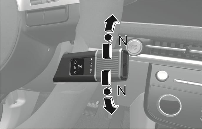 2025 Hyundai Tucson rotary gear shift dial image. Curved arrows indicate rotating the dial upwards or downwards to select the N position. The lever displays D, N, R indicators and a P button on the end. Explains the function of shifting the gear to the Neutral (N) position.
