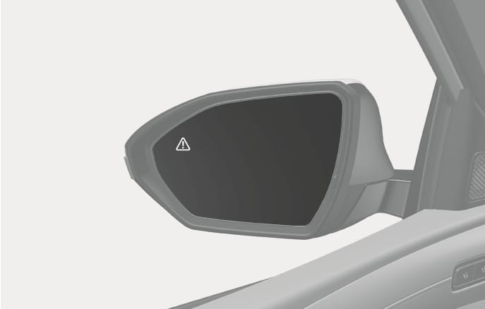 2025 Hyundai Tucson outside rearview mirror image. The image displays the driver's side exterior mirror with a triangular warning icon containing an exclamation mark on the mirror glass. This illustrates the design of the outside rearview mirror and the position of the safety warning indicator.