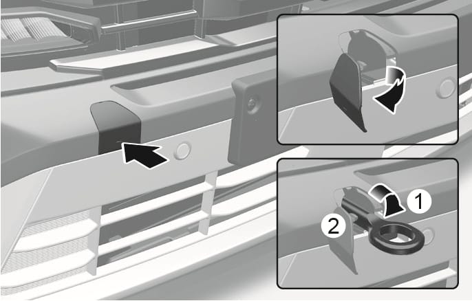 2025 Hyundai Tucson front towing hook installation image. An arrow indicates pressing the lower part of the bumper cover. Insets show the cover opening and the towing hook (2) being screwed clockwise into the socket behind the cover (1). Explains how to open the cover and install the towing hook.