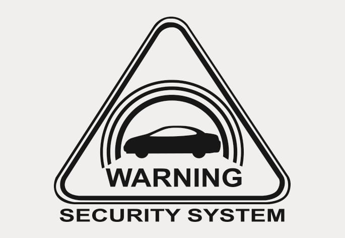 2025 Hyundai Tucson theft-alarm system warning label image. A triangular label shows a car silhouette under curved lines with 'WARNING' text inside and 'SECURITY SYSTEM' text below. Indicates the vehicle is equipped with a theft alarm system.