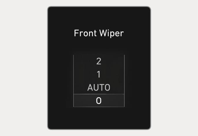 2025 Hyundai Tucson Front Wiper display Type B image. The cluster screen displays the text 'Front Wiper' and a vertical list of wiper levels: '2', '1', 'AUTO', and '0', with '0' highlighted in a box. It explains the function of displaying the selected wiper speed on the instrument cluster.