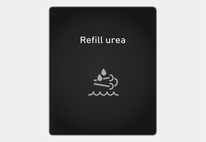 2025 Hyundai Tucson 'Refill urea' warning message image. The instrument cluster displays the text 'Refill urea' and an exhaust icon with droplets. This explains the second warning stage indicating low urea levels, requiring the driver to refill the solution as soon as possible.