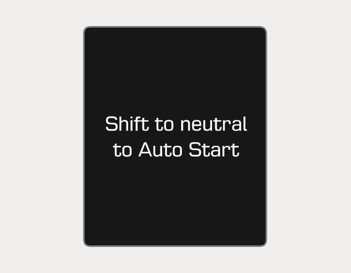 2025 Hyundai Tucson instrument cluster message image. The screen displays the text 'Shift to neutral to Auto Start' in white on a black background. This explains the instruction to shift the gear to Neutral to restart the engine.