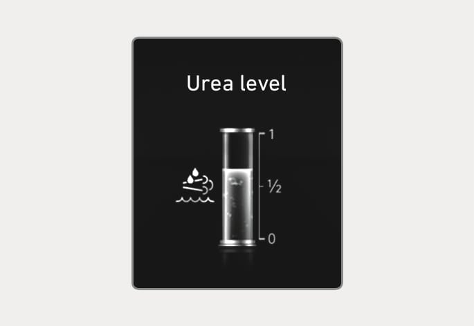 2025 Hyundai Tucson Urea level gauge display image. The screen features the text 'Urea level' and a vertical bar gauge with 0, 1/2, and 1 markings showing the DEF level. A urea system icon is on the left. Explains the function of displaying the remaining urea solution amount on the instrument cluster.