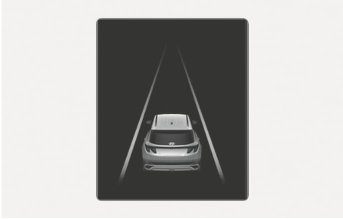 This is an image of the 2025 Hyundai Tucson cluster display. The rear graphic of the vehicle is centered on a dark background, and the lane markings on either side of the vehicle are indicated by gray solid lines. This explains the screen layout that appears on the cluster when the Lane Keeping Assist system fails to detect a lane.